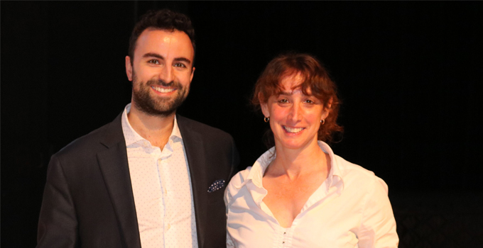 Dr. Anthony Bozzo, Orthopedic Surgery Resident, Hamilton Health Sciences (HHS) and Dr. Michelle Ghert, Orthopedic Oncology Surgeon, HHS and Professor, McMaster University pose for a photo against a black background.