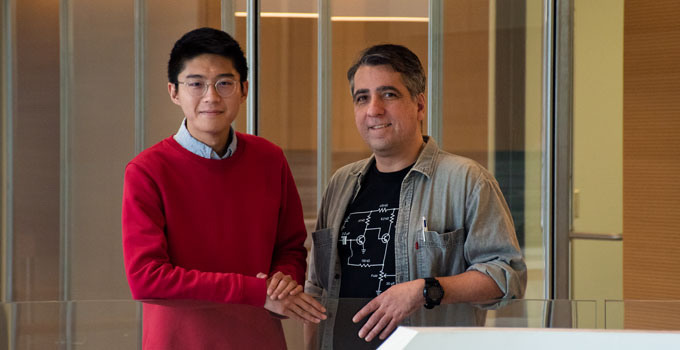 Paul Tang, Computational Biologist, and Philip Zuzarte, Scientific Associate pose for a photo at OICR headquarters. 